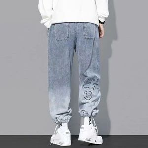 Frühling Herbst Saison Brief gedruckt Jeans Herren lose Cartoon Graffiti Leggings Hosen Trendy Draw string Denim Jeans - Product Image 2