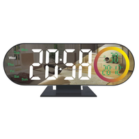 Réveil de table numérique à LED avec affichage de la date, de la semaine et de la température.