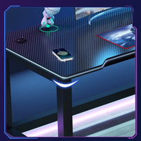 Bureau de jeu noir avec texture en fibre de carbone, poste de travail informatique ergonomique simple pour les joueurs