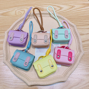 เคสใส่ <span class=keywords><strong>AirPods</strong></span> แบบกระเป๋าเป้สะพายหลังขนาดเล็ก วัสดุ PVC พร้อมพวงกุญแจ กระเป๋าใส่เหรียญ กระเป๋าใส่หูฟัง สำหรับผู้หญิง - Product Image 4