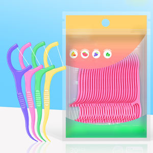 Bâtonnets de fil dentaire jetables aromatisés aux fruits, bâtonnets de fil dentaire en plastique colorés <span class=keywords><strong>pour</strong></span> le nettoyage des <span class=keywords><strong>dents</strong></span>, fil dentaire au charbon de bois, fil dentaire - Product Image 1
