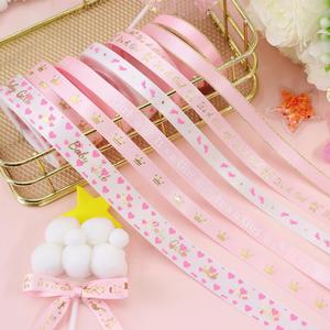 Ruban en polyester doré personnalisé de 1/1,6 cm de large et de 10 yards de long, idéal pour la décoration de fête de révélation du sexe de bébé (fille) - Product Image 1