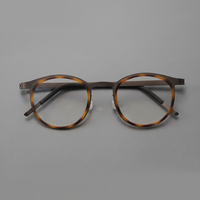 Monturas Ópticas Circulares Unisex de Diseño Moderno, Montura de Gafas de Acetato y Titanio