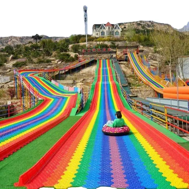 Nuovissimo consiglio a caldo scivolo arcobaleno parco giochi pubblico all'aperto giostre commerciali colorato arcobaleno scivolo per la vendita
