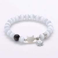 JD GEMS Vente en gros de bijoux en pierre naturelle : Bracelet tête de chat en coquillage papillon, Perles rondes en œil de chat, pour cadeau de couple et d'amis