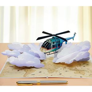Carte de vœux d'anniversaire 3D pop-up avec un design de nuages et de carte du monde, papier finition mate pour les thèmes de voyage ou d'aventure - Product Image 1