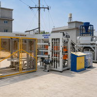 Machine de fabrication de blocs de béton entièrement automatique hydraulique PLC QT8-15P pour pavés creux, briques pleines et bordures