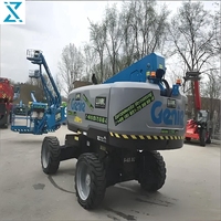 Treuil de chantier diesel Genie S-65XC d'occasion, système de mise à niveau automatique, hauteur de travail de 21,81 m, entretien facile, pompe à engrenages
