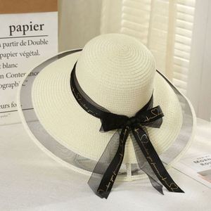 Chapeau de plage en paille à large bord pour femme, protection solaire tendance pour l'extérieur, vente en gros - Product Image 3