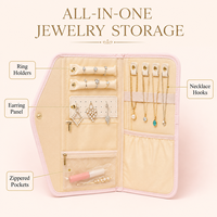 Organisateur de bijoux de voyage simple et élégant en cuir PU matelassé pliable avec porte-bagues, crochets pour colliers et poches zippées – Vente en gros