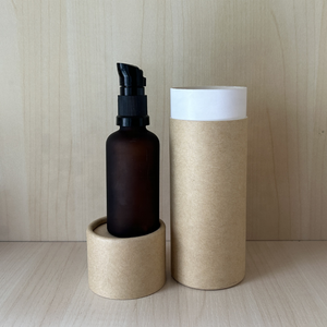Flacon de soins de la <span class=keywords><strong>peau</strong></span> à pompe en verre ambré vide personnalisé de 30 ml avec pompe à sérum noir et tube en papier kraft - Product Image 1