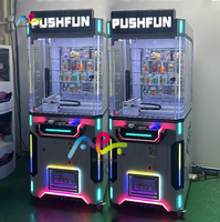 Vente en gros Machine de jeu avec boîte aveugle à pièces Machine de cadeau Push-Push de jeu de marbre