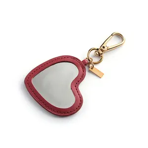 Hot Debossed Logo Cute Red Heart Shape Makeup PU Leather Compact Mirror With Keychain