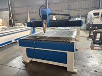 Kit de machine de fraisage CNC 3 axes 4x4 à faible coût avec table à vide à vendre STG1212