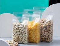 Sacs d'emballage alimentaire transparents à fond plat avec poignée, à huit soudures latérales, pour snacks, céréales, fruits secs, assaisonnements et noix