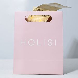 Sac cadeau en papier premium imprimé, rose mat, avec poignées découpées, logo personnalisé, design élégant, pour emballage de luxe et produits de beauté - Product Image 1