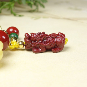 กำไลข้อมือจากแร่ซินนาบาร์ที่มีปริมาณสูง ทรายทองสีม่วง และขี้ผึ้ง พร้อมดีไซน์ปี่เซียะแบบเส้นเดี่ยวหรือหลายเส้น ที่เป็นเครื่องรางเสริมดวง - Product Image 3