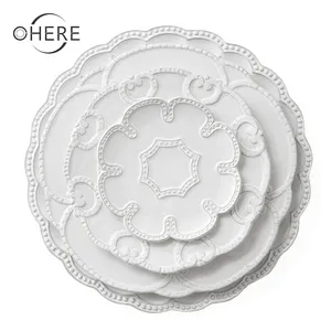 Ohere European retro white Embossed type flower porcelain dinnerware sets luxury ceramic dinner plates for wedding decoration