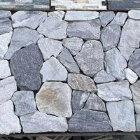 Freiform Naturstein-Verblender aus grauem Quarzit mit unregelmäßigem Muster, mehrfarbige graue Schieferwandverkleidung mit Ecken