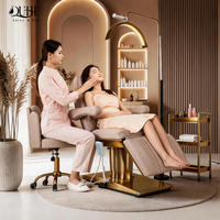 Table de massage électrique de luxe à 3 moteurs réglable pour salon de beauté avec base dorée, idéale pour les soins du visage et des cils