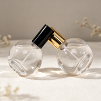 Flacon pulvérisateur de parfum sphérique en verre transparent 30ml 50ml 75ml 100ml vide avec impression personnalisée du logo pour emballage de parfum