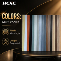 Panneau mural en composite bois-plastique WPC de style moderne pour décoration intérieure, revêtement mural en PVC cannelé pour intérieur