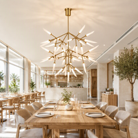 Lustre Cano Lighting Gold Starburst, feuilles en verre blanc givré sur bras métalliques fins, lumière de plafond pour la maison au éclat chaleureux
