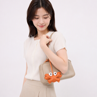Breloque de sac en forme de crabe mignon, pendentif en similicuir orange, petit accessoire animal pour sac à main et porte-clés
