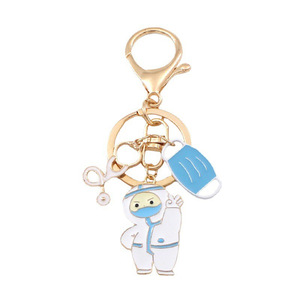 Mignon blanc médical ange porte-clés métal émail infirmière médecin porte-clés dessin animé seringue stéthoscope porte-clés pendentif - Product Image 5