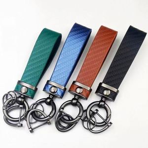 Wholesale <b>Custom</b> Luxury Retro Premium Leather <b>Keychain</b> with Premium Logo Alloy Metal Car <b>Keychain</b> for Gifts Carton Pattern Style - Product Image 2