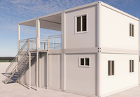 Maison conteneur préfabriquée modulaire en acier de 20 pieds avec mur rideau en verre pour bureau, studio, jardin, extérieur