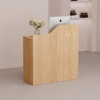 Comptoir de caisse minimaliste moderne pour petite clinique, bureau de réception noir pour salon de beauté, comptoir de caisse pour boutique, bureau d'accueil