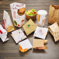 Vente en gros de sacs en papier sulfurisés personnalisés Conception gaufrée Double poche ouverte en forme de L en forme de triangle Burger Donuts Alimentaire résistant à l'huile
