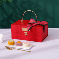 Vente en gros de mini valise en carton rigide décorative de luxe verte rouge orange avec poignée en métal Coffrets cadeaux chocolat en relief