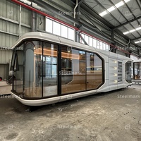 Maisons d'hôtel modernes Maison en conteneur préfabriquée Conception de capsule spatiale Construction rapide avec cadre et matériau en acier