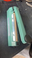 Machine manuelle de cachetage de film plastique de main de scellant de chaleur d'impulsion de prix bon marché d'usine