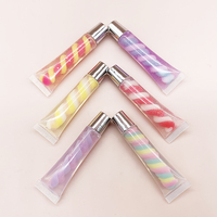 Tube en spirale multicolore en gros d'usine clair liquide hydratant imperméable à l'eau longue durée brillant à lèvres chatoyant parfumé aux fruits