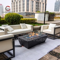 Table de foyer au gaz naturel en acier corten moderne avec aspect travertin brut, 65000 BTU de chaleur, portable pour usage extérieur