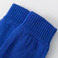 Vente en gros Manchons de mollet de compression de couleur unie de qualité supérieure Protège-tibias de football souples et élastiques personnalisés Chaussettes pour protège-tibia