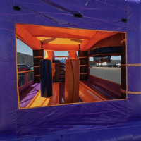 Château gonflable commercial sur le thème de l'océan avec toboggan et palmiers pour la location de fêtes d'enfants