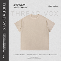 T-shirt à manches courtes col rond en tissu gaufré surdimensionné, teint et délavé, avec bords bruts, personnalisable OEM par THREAD VOX