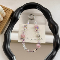 Chaîne de téléphone en alliage avec papillon, cristal et camélia, porte-clés lumineux en forme de rose, breloque pour sac et écouteurs, bijou fantaisie, cadeau, vente en gros