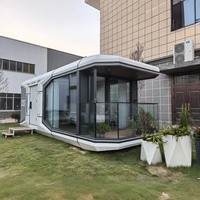 Maison mobile contemporaine en forme de capsule spatiale préfabriquée avec isolation thermique double couche, verre LOW-E, système de chauffage à l'eau pour usage hôtelier