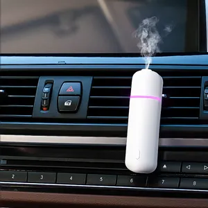 Venda quente Mini Ultrasonic Waterless Aroma Óleo Essencial Car Vent Clip Difusor Home Fragrância Car Scent Difusor Máquina