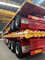 Semi-remorque de transport de marchandises 40 pieds, 3 essieux, 60 tonnes, avec suspension à ressorts et panneau avant, garantie de satisfaction, pour le transport de marchandises irrégulières