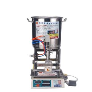Machine de remplissage semi-automatique pour liquides visqueux comme le miel, distributeur de liquides épais - Product Image 1