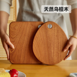 Planche à découper ronde en bois massif, planche à découper de cuisine en bois d'ébène naturel pour fruits et pain, 24x20x2cm - Product Image 3