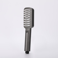 Brosse de massage en silicone de style moderne avec fonction jet de pulvérisation, couleur personnalisée