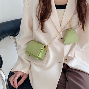 Mini bolso bandolera con cadena para mujer, con hebilla magnética, color sólido, tamaño pequeño para uso en verano - Product Image 1