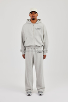 Survêtements de jogging surdimensionnés de 2 pièces pour l'hiver personnalisés de couleur unie Ensemble sweat à capuche et pantalon décontractés pour hommes